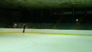 Charlotte Spiral into Double Lutz Double loop (Arms aloft)