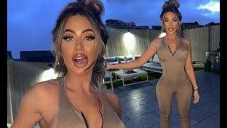 Chloe Ferry goes braless in a plunging skintight top