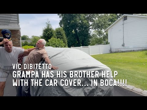 Grampa has his brother help with the car cover… in Boca!!!!