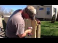 Installing a wooden fence to protect kids, pets