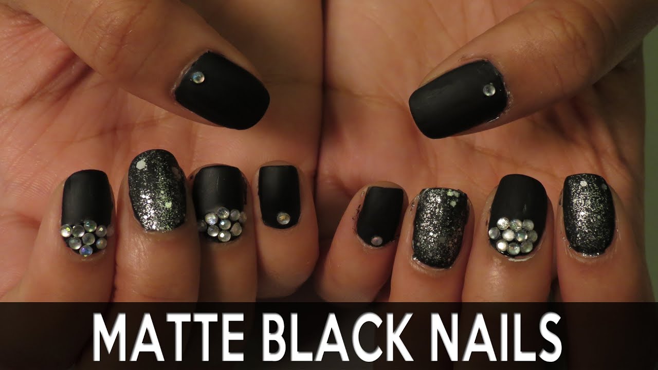 Matte black nails hi-res stock photography and images - Alamy