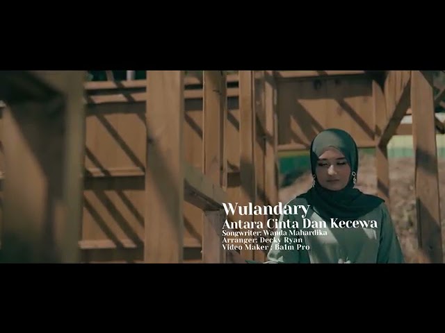 Wulandary - Antara Cinta Dan Kecewa Official Music Video class=