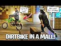 TAKING MY DIRTBIKE INTO A MALL AND DOING WHEELIES ! ( OWNER GETS MAD !) | BRAAP VLOGS