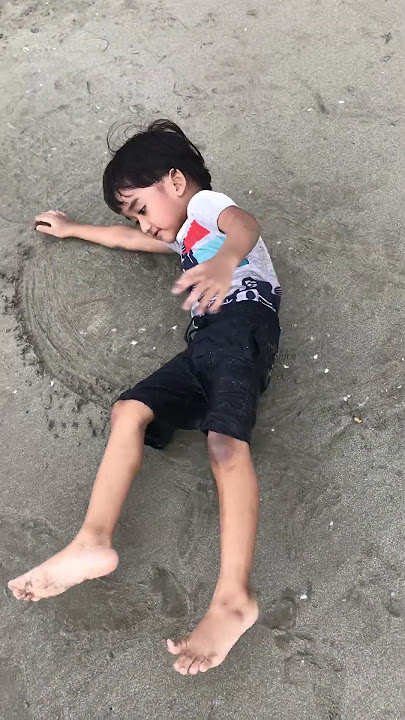 Dien playing at beach in Kota Bahru Y2019