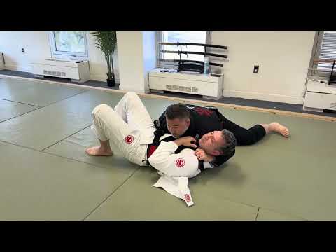 Lapel Choke from top side position. “James Murphy Choke”