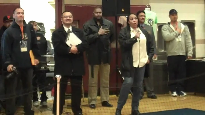 Tammy Calvin singing Star Spangled Banner at Delta...