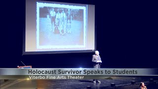 Holocaust survivor Peter Feigl speaks to students