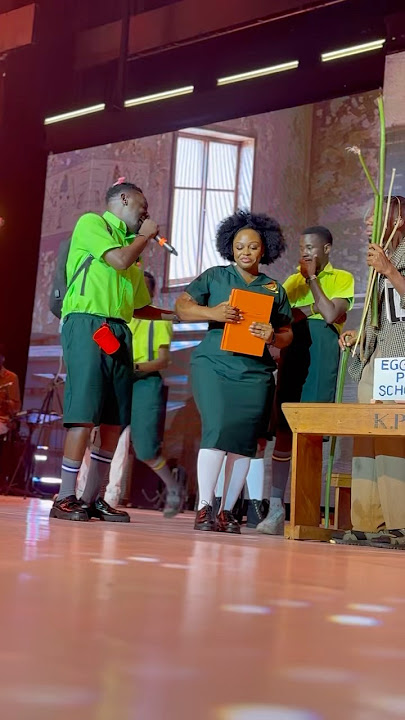 Rema Namakula joins Pastor Wilson Bugembe on stage at Serena Hotel.