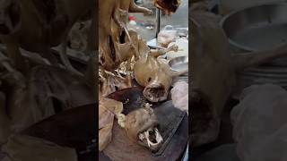 Steamed dog meat, a street food dish