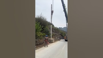 Harnessing Power: The Installation of Electric Poles