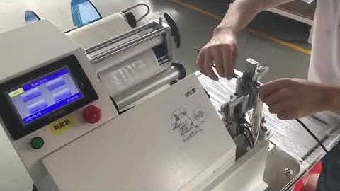 Test run video of Semi-auto flag folding labeling machine for Poland customer 1- 2.5cm diameter