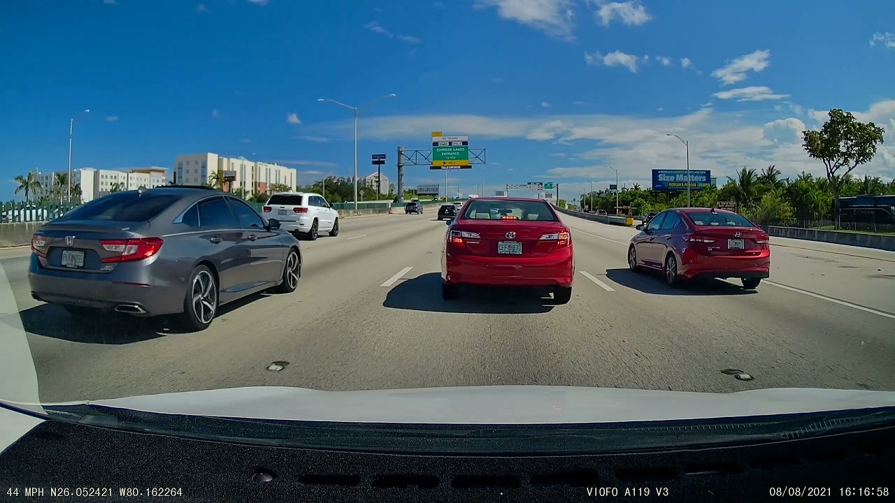 Idiot driver misses exit, almost hits car and then stops on highway ...