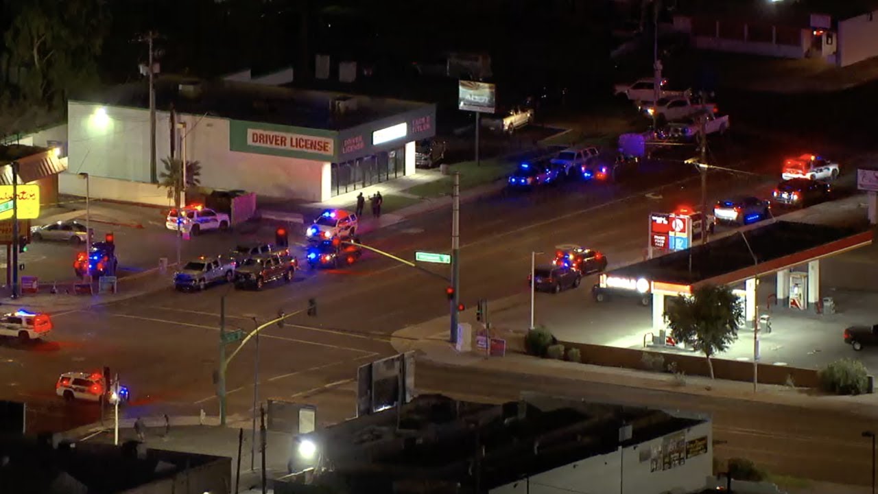 Two officers injured in Phoenix shooting, suspect search underway - YouTube