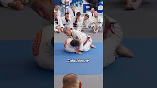 Sweet details from the whizzer in half guard.