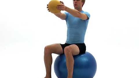 Strength - Trunk Rotation on Swiss Ball holding Med Ball
