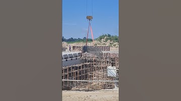 Reinforcement bar of bridge beam lift to install by tower crane