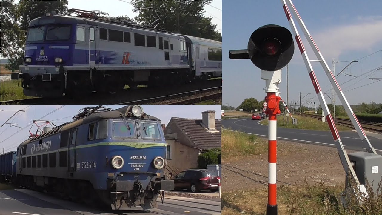 2 Pociągi - ET22-914 i EU07A-002 z iC ''Heweliusz'' na przejeździe kolejowym w Klonówcu.