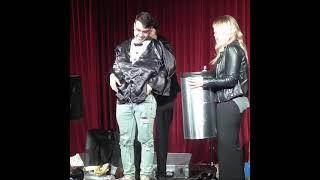 Wedding proposal during magic show