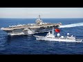 What happens when a chinese spy ship gets too close to a us aircraft carrier