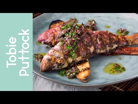 Grilled red mullet, black olive sauce and bruschetta