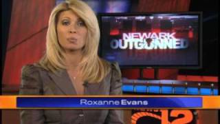 Mayor Cory Booker talks to Roxanne Evans in Newark Outgunned