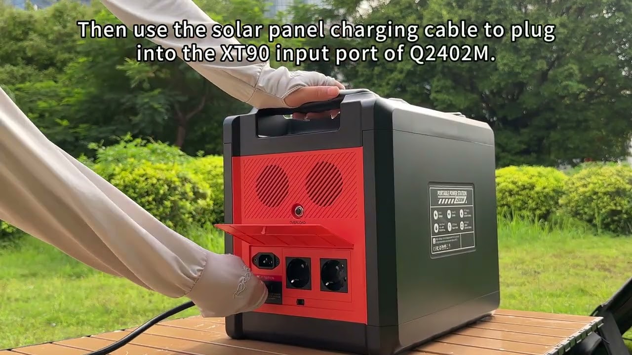 Solarplay Q2402M portable power bank connected to solar panel for charging