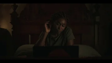 Does Holly get scratched in the Outsider?