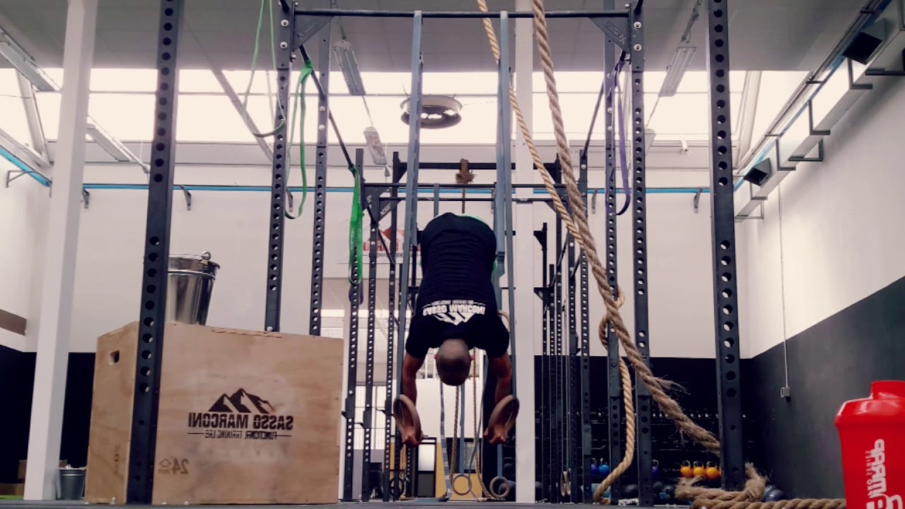 Rings press to handstand & deficit push up