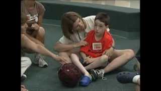 Bonnie Vaillancourt M.S. CCC-SLP working with Camp Can-Do