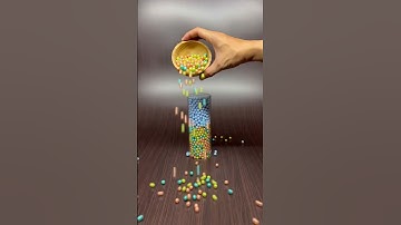 Beads Flow Backwards in Glass – Hypnotic Loop 🔄🌈 #oddlysatisfying #asmr #reversevideo