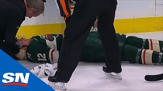 Eric Staal Down On Ice After Huge Collision With Linesman