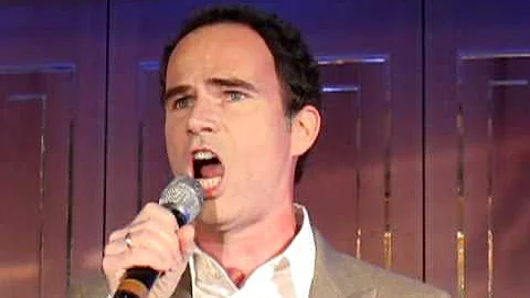 Thomas Borchert singing at the presentation of the...