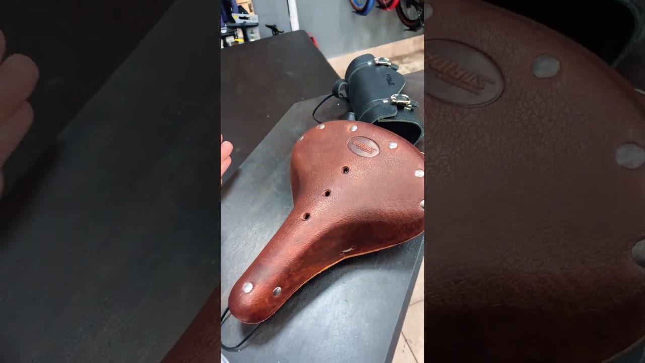 Классическое кожаное седло STRIDA с пружинами и подседельная кожаная cумка на магнитных застежках