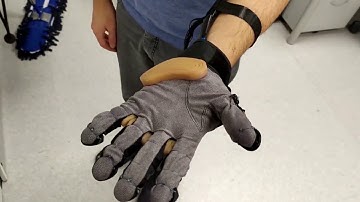 Hybrid Soft Exoskeleton Glove with a Telescopic Extra Thumb, Abduction Capabilities - RoboSoft 2020