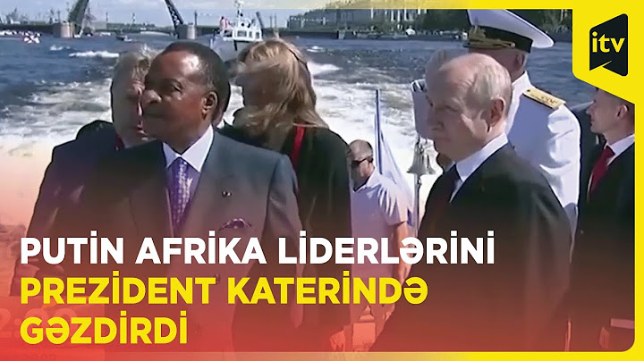Rusiya Prezidenti Vladimir Putin paradda iştirak edən Afrika liderləri ilə gəzintidə
