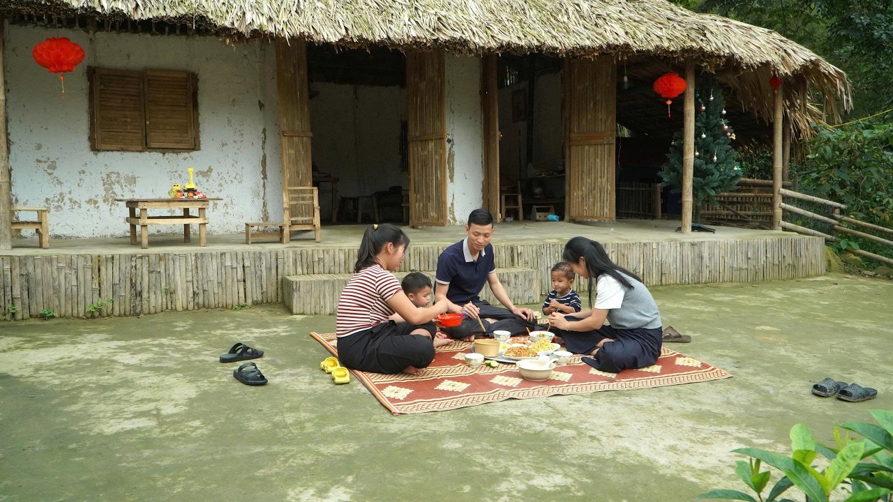 Семейный ужин — приготовление традиционных блюд на Тет вместе с двумя сыновьями.