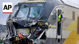15 hurt in Florida when train hits fire truck that drove onto tracks after another train passed
