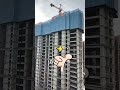 The construction climbing formwork is fully enclosed and protected.
