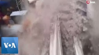 Debris Falls on Rescuers Scrambling to Find Survivors | VOA News