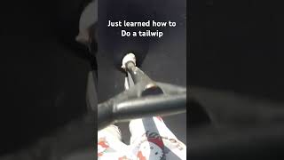 Tricks on trampoline with scooter