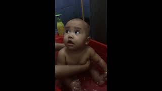 Happy Asian Cute Baby Taking A Bath In Red Bathtub