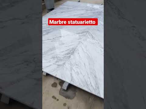 تقطيع الرخام على شكل كتاب مفتوح   