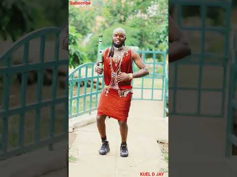 Massai Man Trying South Sudanese Dergel