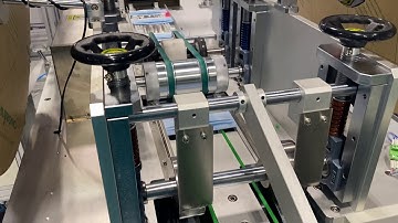 automatic tie on mask machine with auto box packer
