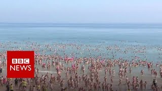 World Record Set For Largest Skinny Dip - Bbc News