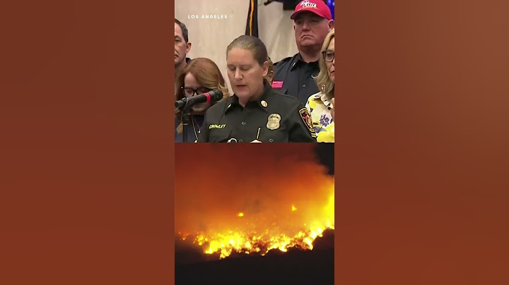 Winds subside as firefighters battle devastating blazes in Los Angeles area