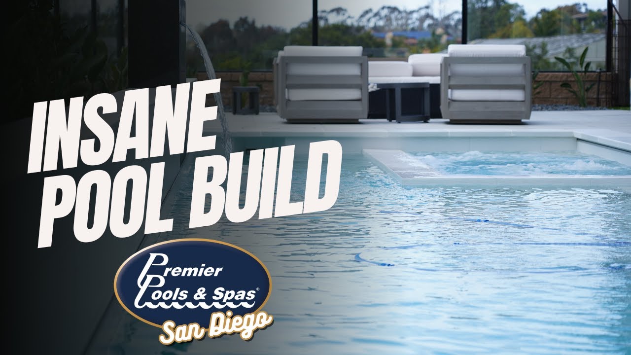 Serene Pool With Waterfall Feature and Jacuzzi - Pool Builder San San Diego