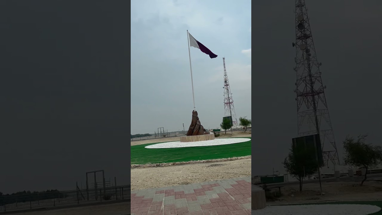 National flag of Qatar🇶🇦.🌺. Middle of the city 🌆. Coming national day. 