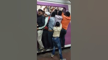 Rush in Mumbai local train.Crowd at ghatkopar station