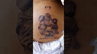 Mother and son tattoo